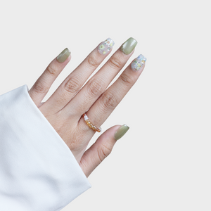 SIYOU Sage Blossom press-on nails on hand